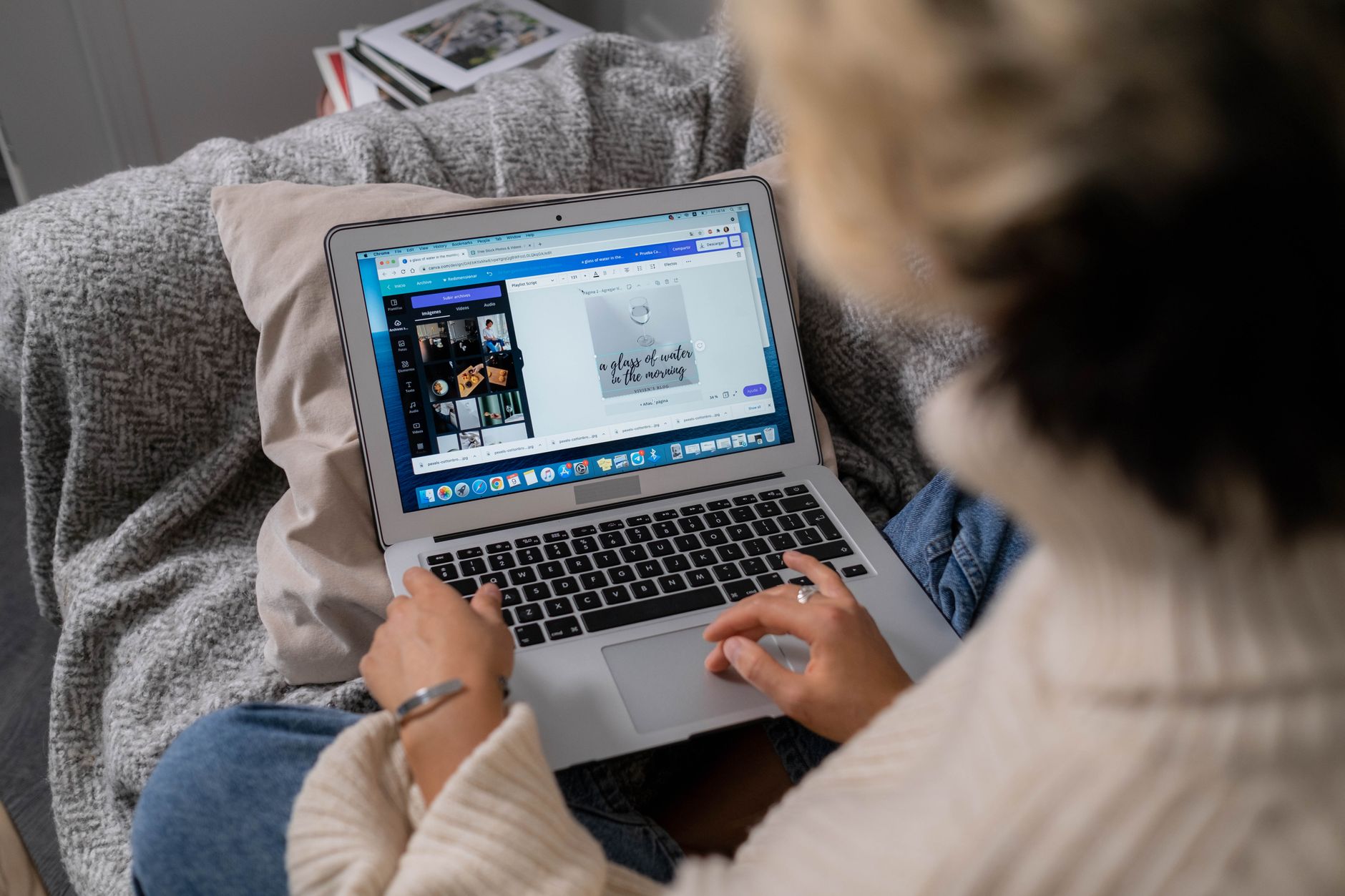 a woman designing a template in Canva on a laptop with a clean desk